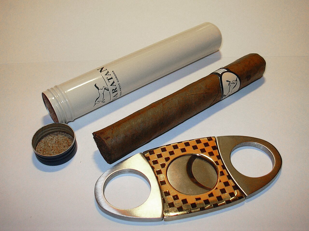 Cigar with cutter and accessories